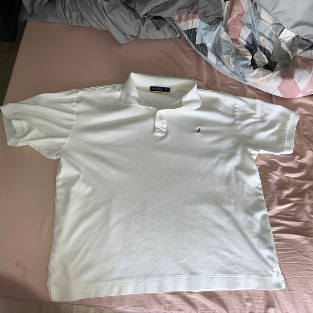 Men’s white Nautica polo - XL - small stain on bottom left hand side
